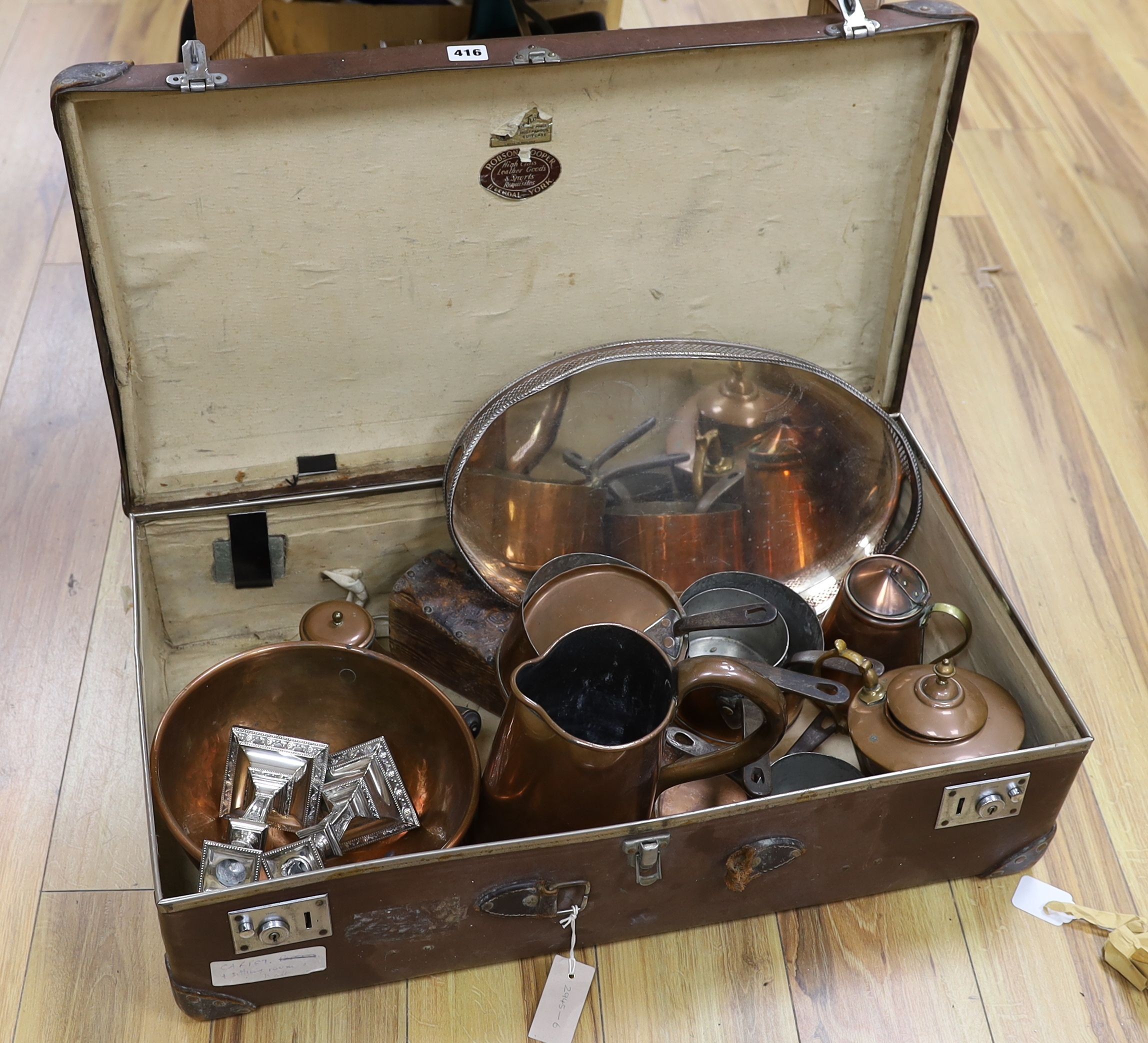 Copper and silver plated ware in trunk